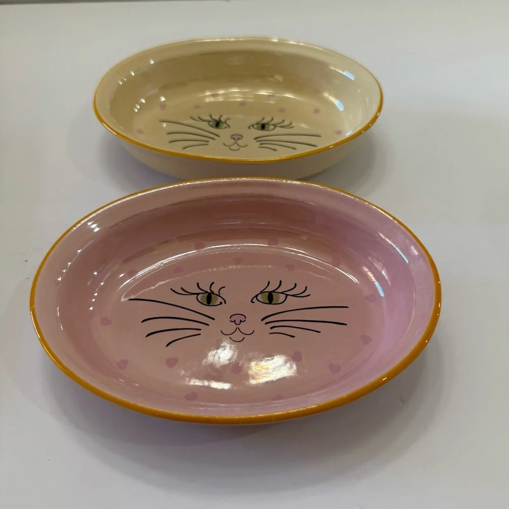 Cat face bowls. For Food and water by Castle mere pet company